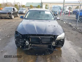 2015 BMW 5 Series 528i xDrive with VIN WBA5A7C5XFD624325, listed as a IAAI auction lot 41528322 with 111,054 mi miles and . Bid and sale history available at carsss.com. Image 6.
