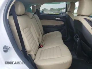 2020 Ford Edge SEL z VIN 2FMPK4J95LBB21392, wystawiony jako Copart lot #60912275 z przebiegiem 82 527 mil mil oraz Szkoda całkowita • Salvage title. Historia ofert i sprzedaży dostępna na DreamBid. Obrazek 11.