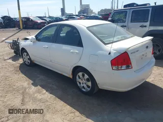 2009 Kia Spectra EX with VIN KNAFE221X95624138, listed as a IAAI auction lot 41823611 with 136,790 mi miles. Bid and sale history available at carsss.com. Image 3.