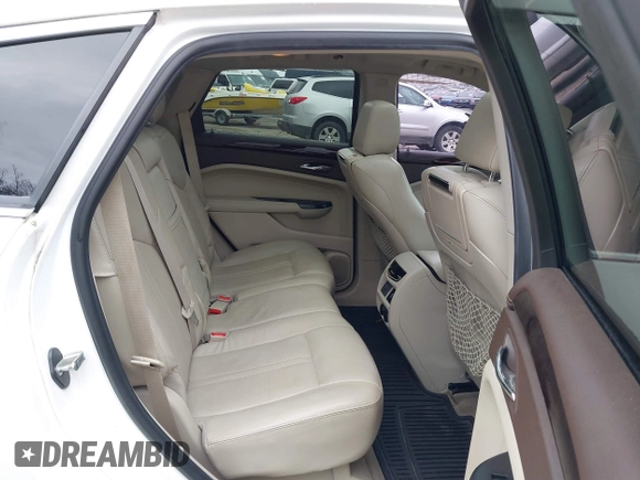 2014 Cadillac SRX Premium Collection z VIN 3GYFNDE34ES548826, wystawiony jako IAAI lot #40792942 z przebiegiem 115 984 mil mil oraz . Historia ofert i sprzedaży dostępna na DreamBid. Obrazek 8.