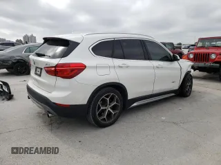 2018 BMW X1 sDrive28i with VIN WBXHU7C3XJ5H44902, listed as a Copart auction lot 46373033 with 49,520 mi miles. Bid and sale history available at carsss.com. Image 3.
