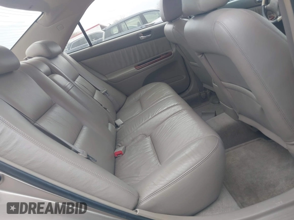 2003 Toyota Camry LE with VIN 4T1BE30K73U248560, listed as a IAAI auction lot 41889516 with 179,961 mi miles and . Bid and sale history available at DreamBid. Image 8.