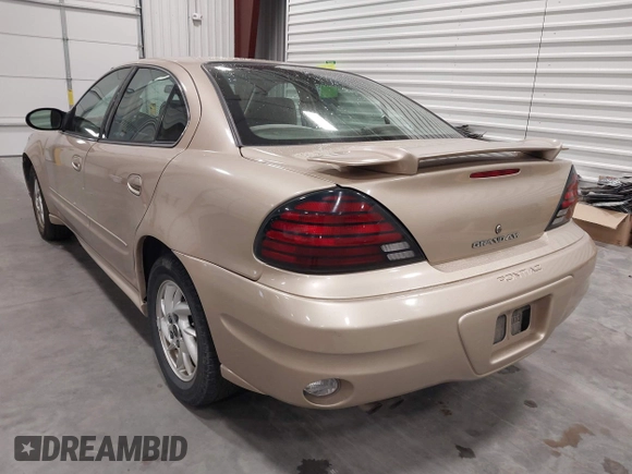 2003 Pontiac Grand Am SE1 with VIN 1G2NF52EX3C104710, listed as a IAAI auction lot 42053621 with 102,012 mi miles. Bid and sale history available at carsss.com. Image 3.