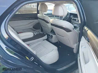 2018 Genesis G90 3.3T Premium with VIN KMHG34JA5JU043341, listed as a IAAI auction lot 41272841 with 33,527 mi miles. Bid and sale history available at carsss.com. Image 8.