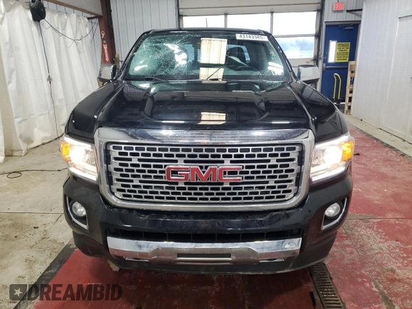 2019 GMC Canyon 4WD Denali with VIN 1GTG6EEN5K1162458, listed as a Copart auction lot 43143385 with 55,047 mi miles and Salvage Title. Bid and sale history available at carsss.com. Image 5.