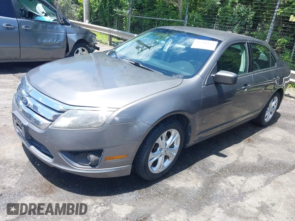 2012 Ford Fusion SE with VIN 3FAHP0HG5CR291511, listed as a IAAI auction lot 42546174 with 241,493 mi miles and . Bid and sale history available at DreamBid. Image 2.