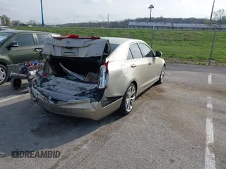 2013 Cadillac ATS Premium z VIN 1G6AE5S33D0101388, wystawiony jako IAAI lot #41921020 z przebiegiem 160 616 mil mil oraz . Historia ofert i sprzedaży dostępna na DreamBid. Obrazek 4.