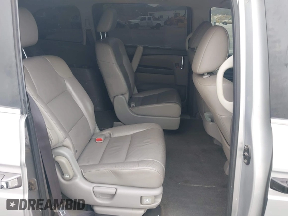 2014 Honda Odyssey LX z VIN 5FNRL5H28EB064426, wystawiony jako IAAI lot #42207634 z przebiegiem 169 706 mil mil oraz . Historia ofert i sprzedaży dostępna na DreamBid. Obrazek 8.