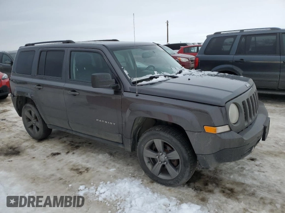 2015 Jeep Patriot North with VIN 1C4NJRAB7FD311725, listed as a Copart auction lot 82647074 with 185,560 mi miles and Salvage Title. Bid and sale history available at carsss.com. Image 4.