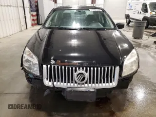 2008 Mercury Milan Premier z VIN 3MEHM08198R655613, wystawiony jako Copart lot #61052595 z przebiegiem 241 329 mil mil oraz Szkoda całkowita • Salvage title. Historia ofert i sprzedaży dostępna na DreamBid. Obrazek 5.