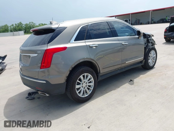 2018 Cadillac XT5 FWD with VIN 1GYKNARS5JZ145739, listed as a IAAI auction lot 42443337 with 50,917 mi miles and . Bid and sale history available at DreamBid. Image 4.