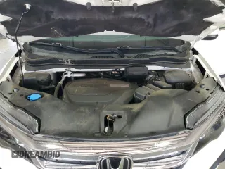 2019 Honda Pilot EX-L z VIN 5FNYF6H55KB080078, wystawiony jako Copart lot #55938415 z przebiegiem 54 857 mil mil oraz Szkoda całkowita • Salvage title. Historia ofert i sprzedaży dostępna na DreamBid. Obrazek 12.