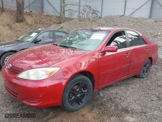2002 Toyota Camry LE with VIN 4T1BE32K42U099357, listed as a IAAI auction lot 42075943 with 191,685 mi miles. Bid and sale history available at carsss.com. Image 2.