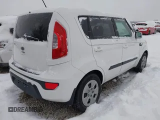 2012 Kia Soul with VIN KNDJT2A51C7400114, listed as a IAAI auction lot 41304983 with 126,666 mi miles. Bid and sale history available at carsss.com. Image 4.