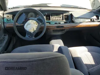 1999 Mercury Grand Marquis GS z VIN 2MEFM74W5XX711421, wystawiony jako Copart lot #53062605 z przebiegiem 106 913 mil mil oraz Nie do naprawy • Non repairable. Historia ofert i sprzedaży dostępna na DreamBid. Obrazek 8.