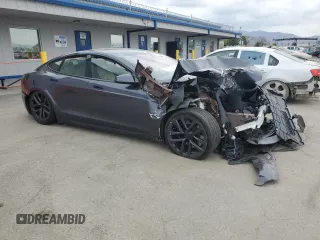 2022 Tesla Model S with VIN 5YJSA1E5XNF474238, listed as a Copart auction lot 54220115 with Not provided miles and Salvage title. Bid and sale history available at DreamBid. Image 4.