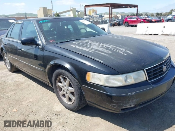 1998 Cadillac Seville STS z VIN 1G6KY5499WU916185, wystawiony jako IAAI lot #42035783 z przebiegiem 164 763 mil mil oraz . Historia ofert i sprzedaży dostępna na DreamBid. Obrazek 1.