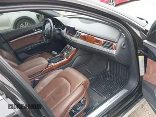 2012 Audi A8 с VIN WAUAVAFD0CN035731, выставлен на аукционе IAAI как лот 41286022 с пробегом 82 835 миль миль и . История ставок и продаж доступна на DreamBid. Изображение 5.