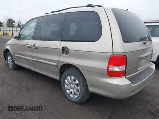 2004 Kia Sedona LX with VIN KNDUP131746563430, listed as a IAAI auction lot 41896386 with 141,526 mi miles. Bid and sale history available at carsss.com. Image 3.