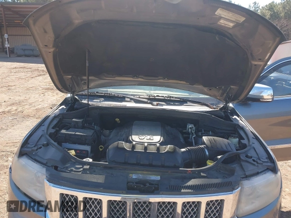 2012 Jeep Grand Cherokee Overland with VIN 1C4RJECT7CC105614, listed as a IAAI auction lot 41629174 with 264,756 mi miles. Bid and sale history available at carsss.com. Image 10.