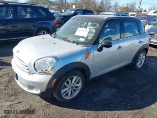 2012 MINI Cooper Countryman with VIN WMWZB3C50CWM04795, listed as a IAAI auction lot 41414790 with NaN miles. Bid and sale history available at carsss.com. Image 2.