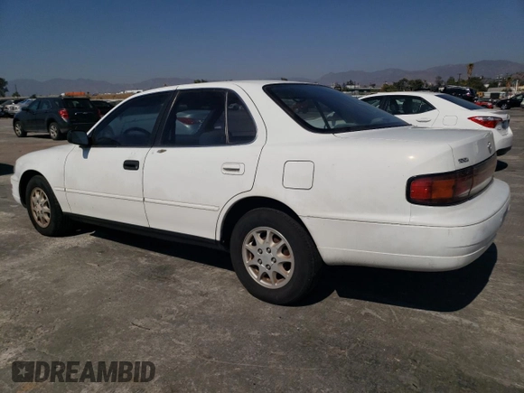 1992 Toyota Camry LE with VIN 4T1SK12E0NU077223, listed as a Copart auction lot 71787194 with 239,027 mi miles and Salvage Title. Bid and sale history available at carsss.com. Image 2.
