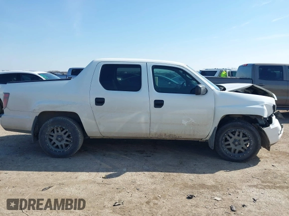 2014 Honda Ridgeline Sport with VIN 5FPYK1F78EB011254, listed as a IAAI auction lot 41564771 with 151,741 mi miles and . Bid and sale history available at DreamBid. Image 14.