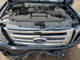 2011 Ford Expedition Limited z VIN 1FMJU2A53BEF42709, wystawiony jako Copart lot #56791995 z przebiegiem 130 867 mil mil oraz Szkoda całkowita • Salvage title. Historia ofert i sprzedaży dostępna na DreamBid. Obrazek 12.