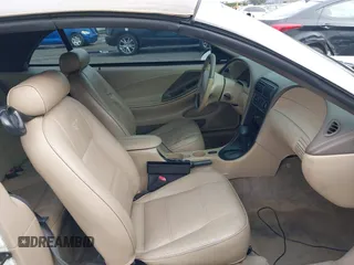 2004 Ford Mustang Deluxe with VIN 1FAFP446X4F134860, listed as a IAAI auction lot 41755643 with 174,410 mi miles. Bid and sale history available at carsss.com. Image 5.