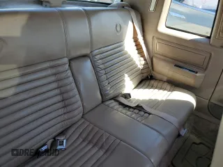 1991 Cadillac Eldorado z VIN 1G6EL13B2MU602660, wystawiony jako Copart lot #67365674 z przebiegiem 108 880 mil mil oraz Szkody całkowita. Historia ofert i sprzedaży dostępna na DreamBid. Obrazek 10.