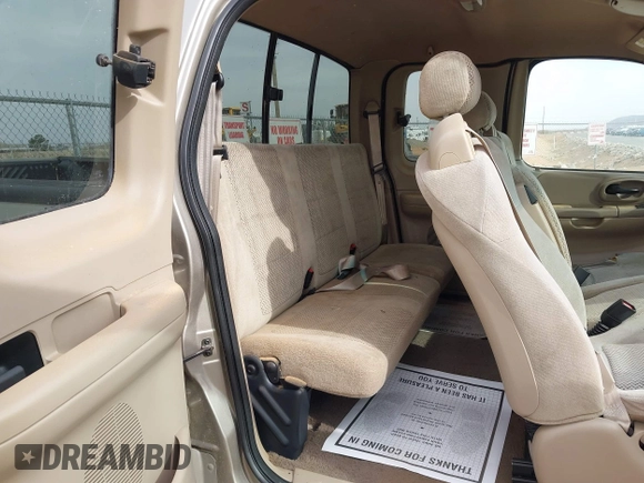 2001 Ford F-150 XL with VIN 2FTRX18L61CA36907, listed as a IAAI auction lot 41906933 with 317,857 mi miles. Bid and sale history available at carsss.com. Image 8.