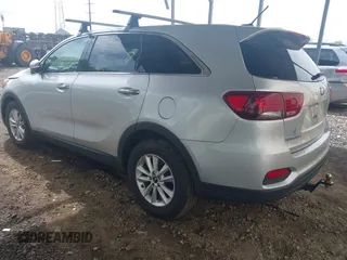 2019 Kia Sorento LX z VIN 5XYPGDA58KG482726, wystawiony jako IAAI lot #42192199 z przebiegiem 79 545 mil mil oraz . Historia ofert i sprzedaży dostępna na DreamBid. Obrazek 3.