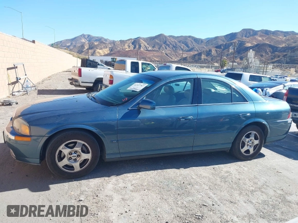 2001 Lincoln LS w/Base Pkg with VIN 1LNHM87A31Y617332, listed as a IAAI auction lot 41317767 with 141,931 mi miles. Bid and sale history available at carsss.com. Image 14.