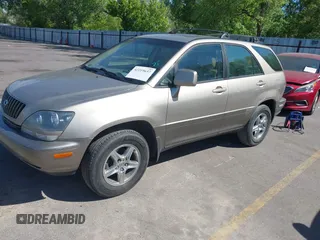 1999 Lexus RX 300 with VIN JT6HF10U9X0080216, listed as a IAAI auction lot 42219637 with 248,595 mi miles and . Bid and sale history available at DreamBid. Image 2.