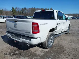 2022 Ram 1500 Laramie with VIN 1C6SRFJTXNN237199, listed as a IAAI auction lot 41705536 with 35,143 mi miles and . Bid and sale history available at DreamBid. Image 4.