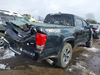 2017 Toyota Tacoma SR5 with VIN 5TFCZ5ANXHX061031, listed as a IAAI auction lot 41218297 with Not Provided miles and . Bid and sale history available at DreamBid. Image 4.
