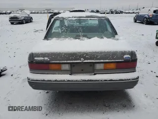 1990 Ford Tempo z VIN 1FAPP36X4LK167346, wystawiony jako Copart lot #84089494 z przebiegiem 66 291 mil mil oraz Szkody całkowita. Historia ofert i sprzedaży dostępna na DreamBid. Obrazek 6.