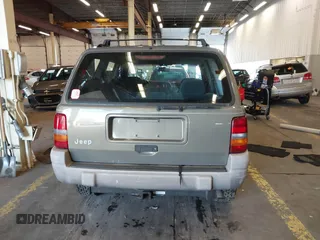 1996 Jeep Grand Cherokee Laredo with VIN 1J4GZ58S9TC293787, listed as a IAAI auction lot 41179368 with 141,755 mi miles. Bid and sale history available at carsss.com. Image 17.
