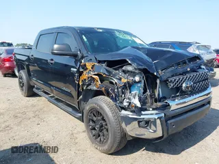 2021 Toyota Tundra SR5 with VIN 5TFDY5F13MX014883, listed as a IAAI auction lot 42566659 with 123,772 mi miles and . Bid and sale history available at DreamBid. Image 1.