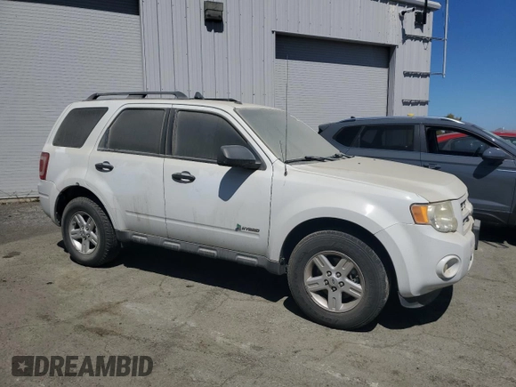 2011 Ford Escape Hybrid z VIN 1FMCU5K39BKA88197, wystawiony jako Copart lot #50896195 z przebiegiem 186 007 mil mil oraz Czysty tytuł • Clean title. Historia ofert i sprzedaży dostępna na DreamBid. Obrazek 4.