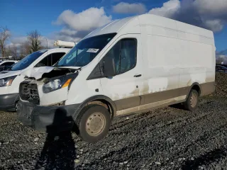 2019 Ford Transit Cargo with VIN 1FTBW3XM7KKA39855, listed as a Copart auction lot 85120994 with 121,522 mi miles and Salvage Title. Bid and sale history available at DreamBid. Image 1.