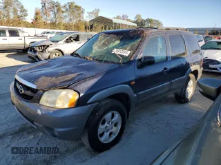 2002 Mazda Tribute LX with VIN 4F2YU09172KM62596, listed as a Copart auction lot 76912034 with 225,892 mi miles and Salvage Title. Bid and sale history available at carsss.com. Image 2.