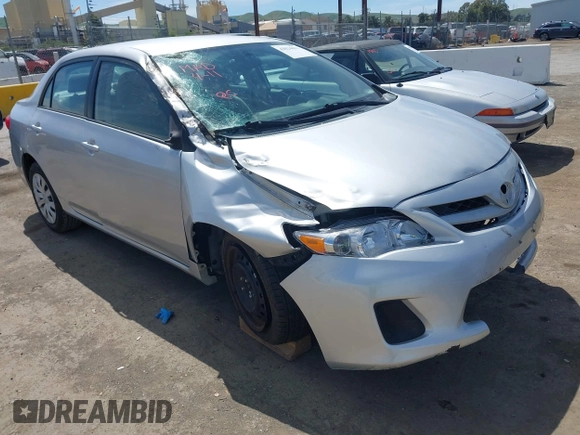 2011 Toyota Corolla L with VIN 2T1BU4EE1BC572731, listed as a IAAI auction lot 42024851 with 153,923 mi miles. Bid and sale history available at carsss.com. Image 1.