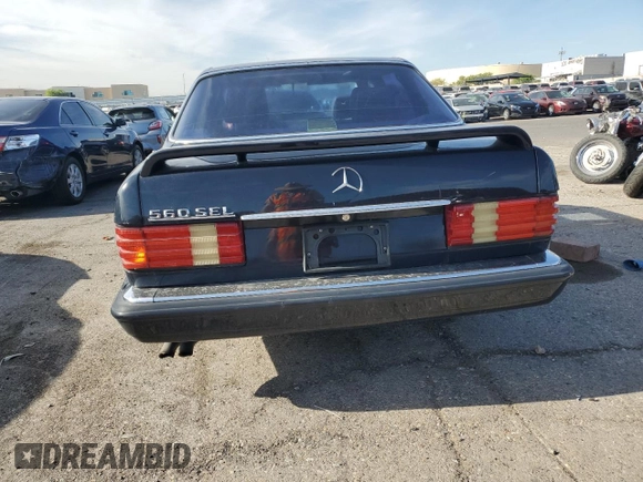 1990 Mercedes-Benz 560 with VIN WDBCA39EXLA503543, listed as a Copart auction lot 65978444 with 195,635 mi miles and Clean Title. Bid and sale history available at DreamBid. Image 6.