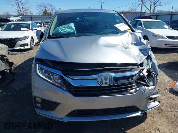 2018 Honda Odyssey EX-L with VIN 5FNRL6H71JB077112, listed as a IAAI auction lot 41721523 with 70,893 mi miles. Bid and sale history available at carsss.com. Image 12.