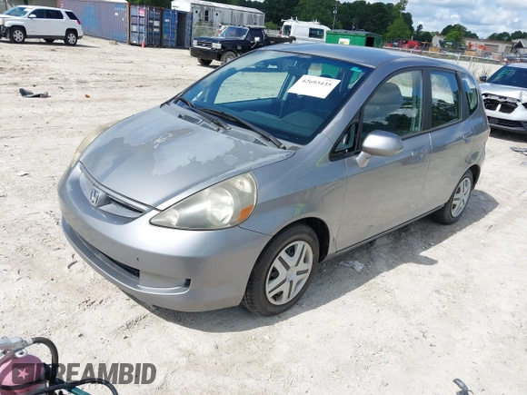 2008 Honda Fit with VIN JHMGD38468S001440, listed as a IAAI auction lot 42693435 with 65,239 mi miles and . Bid and sale history available at DreamBid. Image 2.