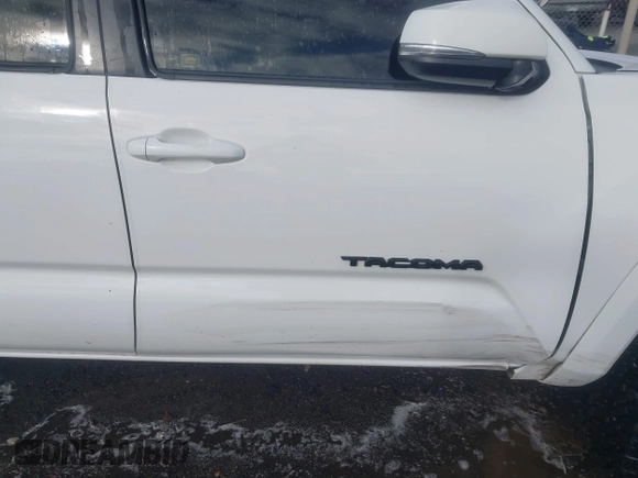 2019 Toyota Tacoma SR z VIN 3TMCZ5AN9KM284092, wystawiony jako IAAI lot #41774851 z przebiegiem 100 031 mil mil oraz . Historia ofert i sprzedaży dostępna na DreamBid. Obrazek 19.