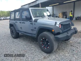 2014 Jeep Wrangler Unlimited Sport with VIN 1C4BJWDG3EL135351, listed as a IAAI auction lot 41947408 with 104,460 mi miles. Bid and sale history available at carsss.com. Image 1.