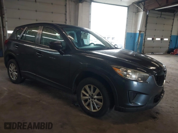 2013 Mazda CX-5 Sport z VIN JM3KE2BE0D0131781, wystawiony jako IAAI lot #42202370 z przebiegiem 240 516 mil mil oraz . Historia ofert i sprzedaży dostępna na DreamBid. Obrazek 1.