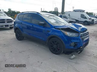 2018 Ford Escape SE z VIN 1FMCU0GD2JUC27271, wystawiony jako IAAI lot #41947047 z przebiegiem 154 672 mil mil oraz . Historia ofert i sprzedaży dostępna na DreamBid. Obrazek 1.